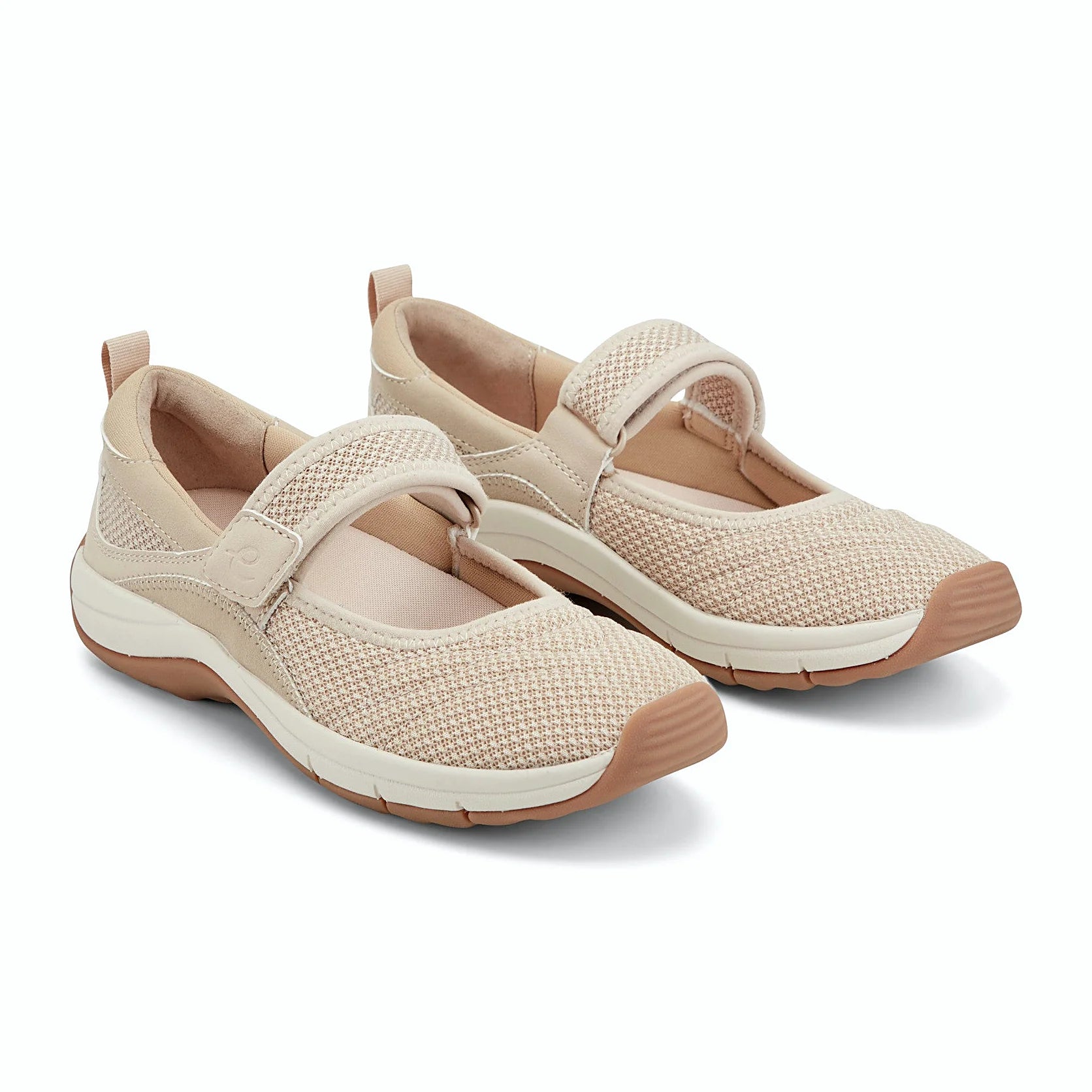 Hook-and-loop strap across the instep of a knit shoe