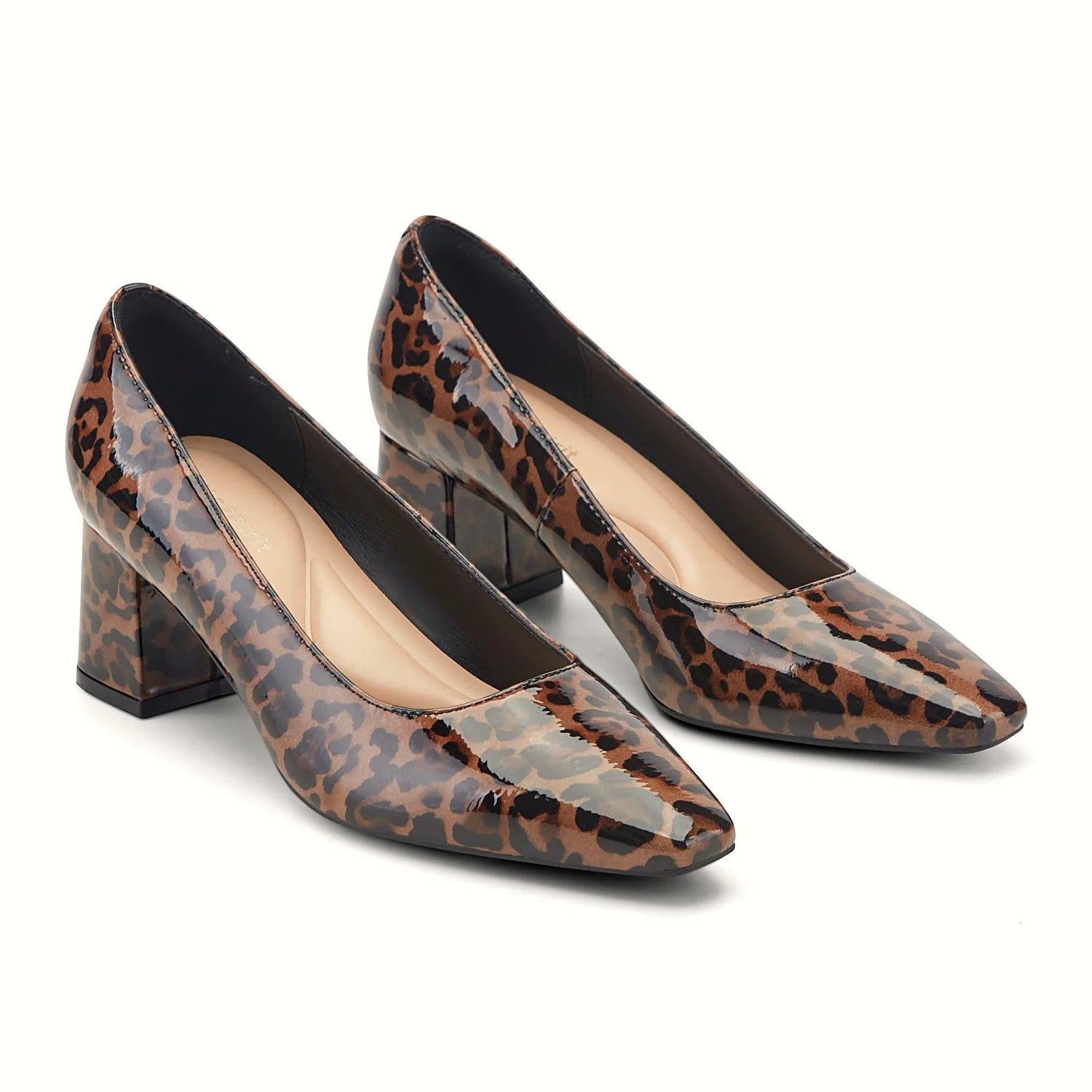 Sleek block heel under a leather dress pump