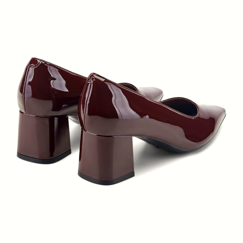 Natural-toned leather upper on a block heel pump