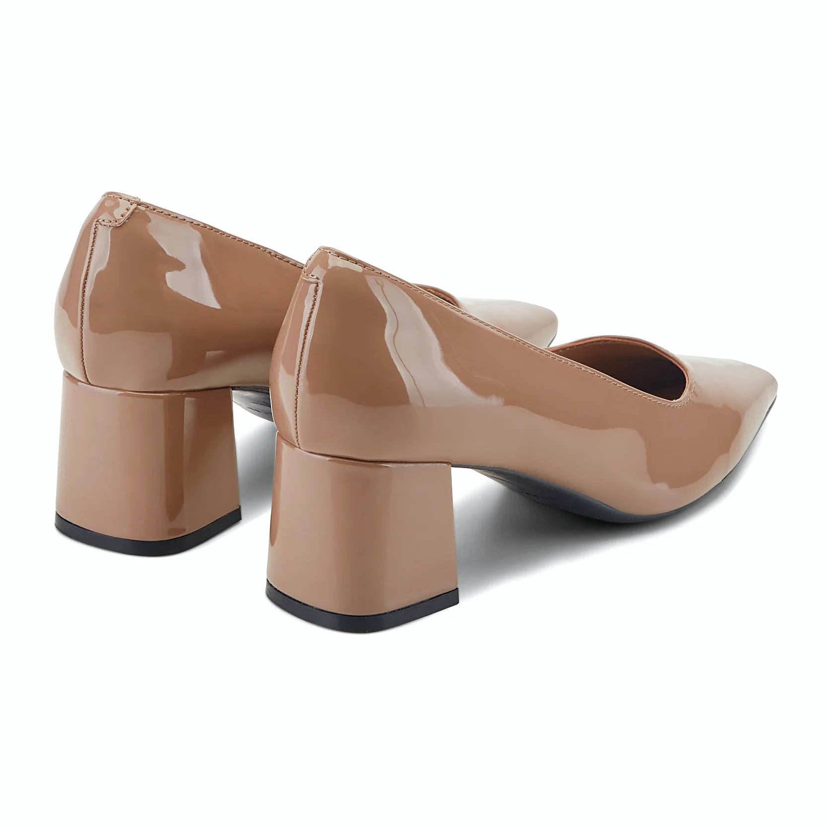 Sleek block heel under a leather dress pump