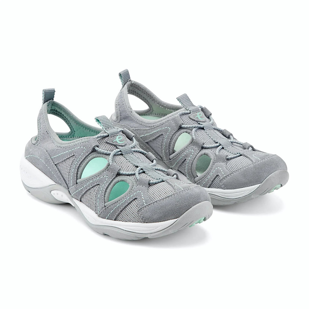 Bungee lace system across a sporty walking shoe