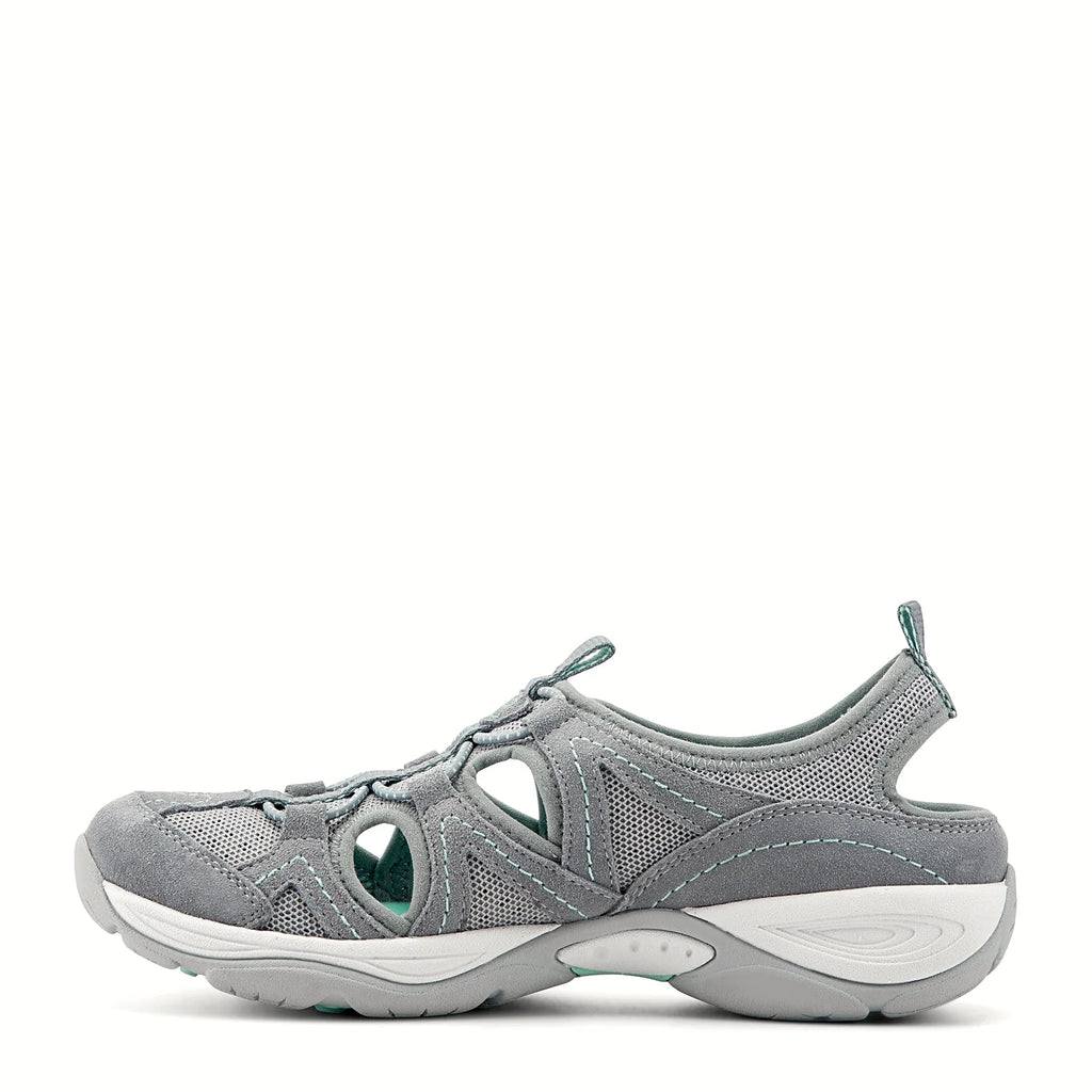 Removable contoured footbed from a walking shoe