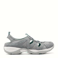 Walking shoe with soft suede overlays and cut-out panels
