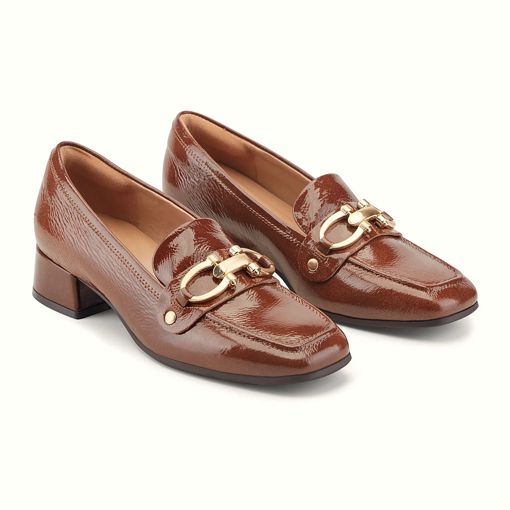 Block heel under a leather loafer