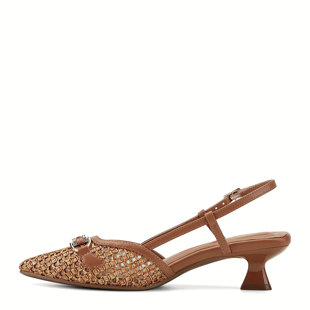 Adjustable ankle buckle on a slingback pump