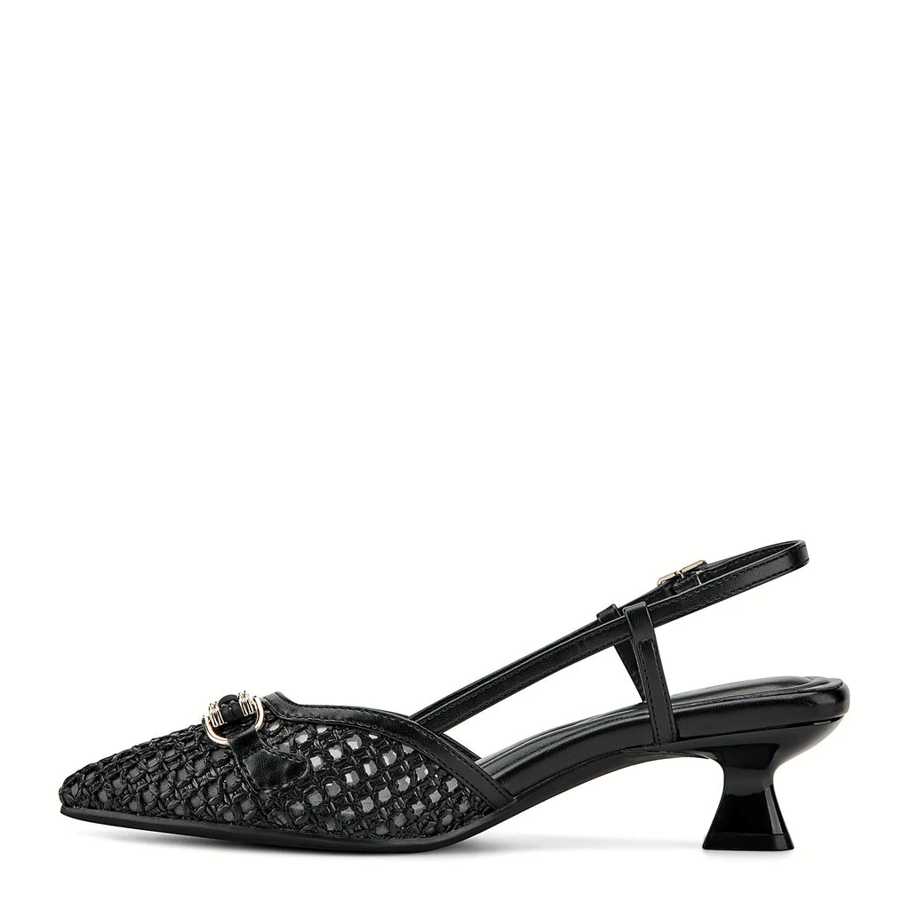Adjustable ankle buckle on a slingback pump