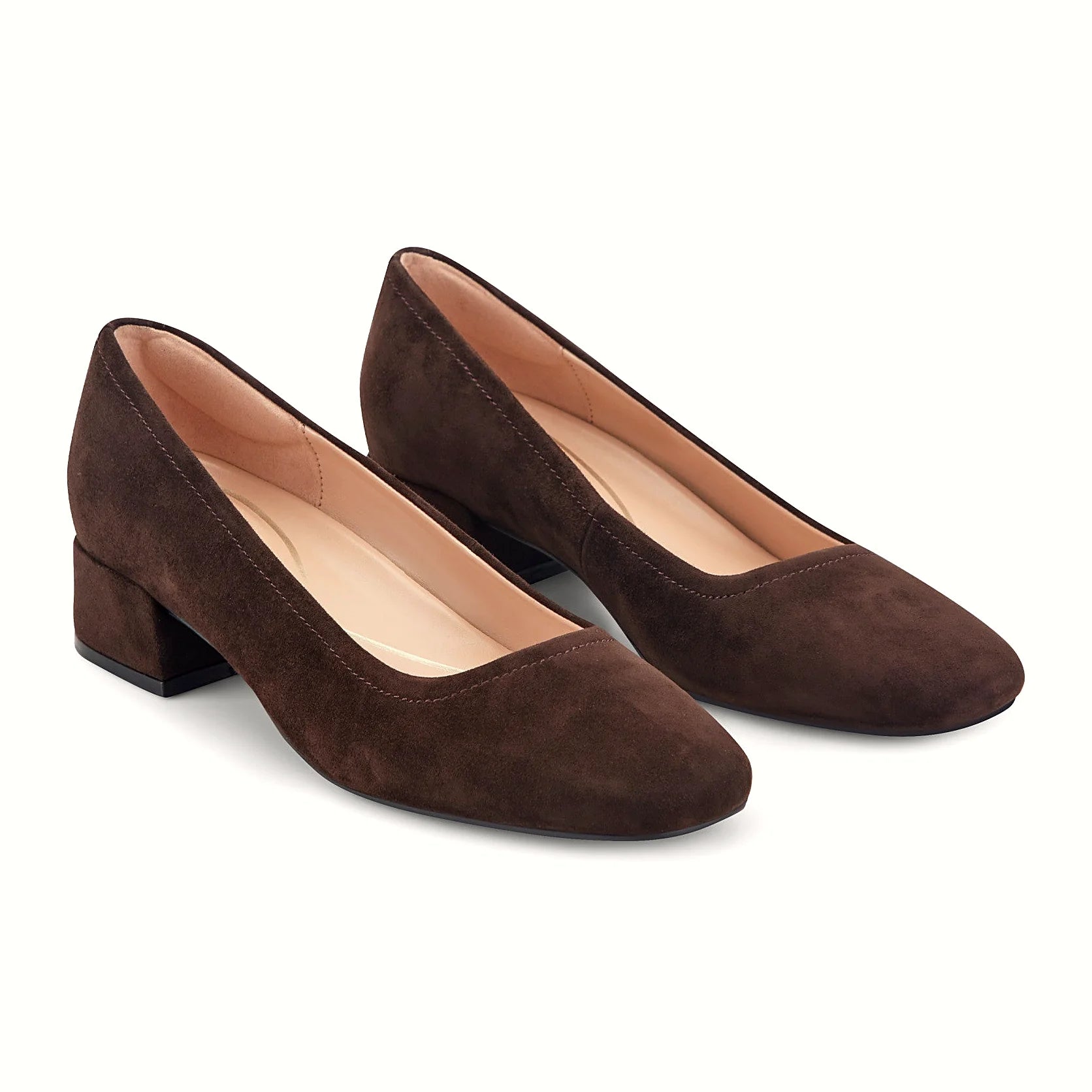 Low block heel under a leather dress pump