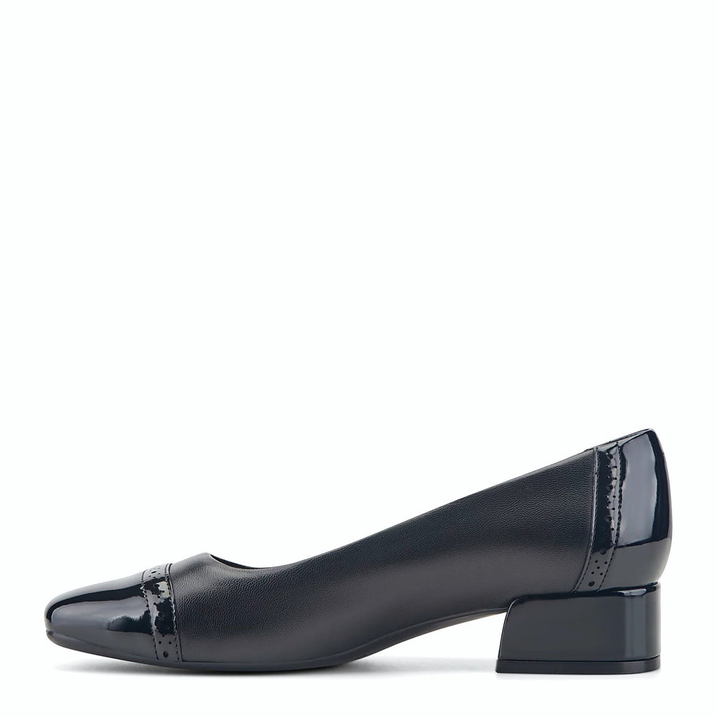 Cushioned footbed inside a patent pump