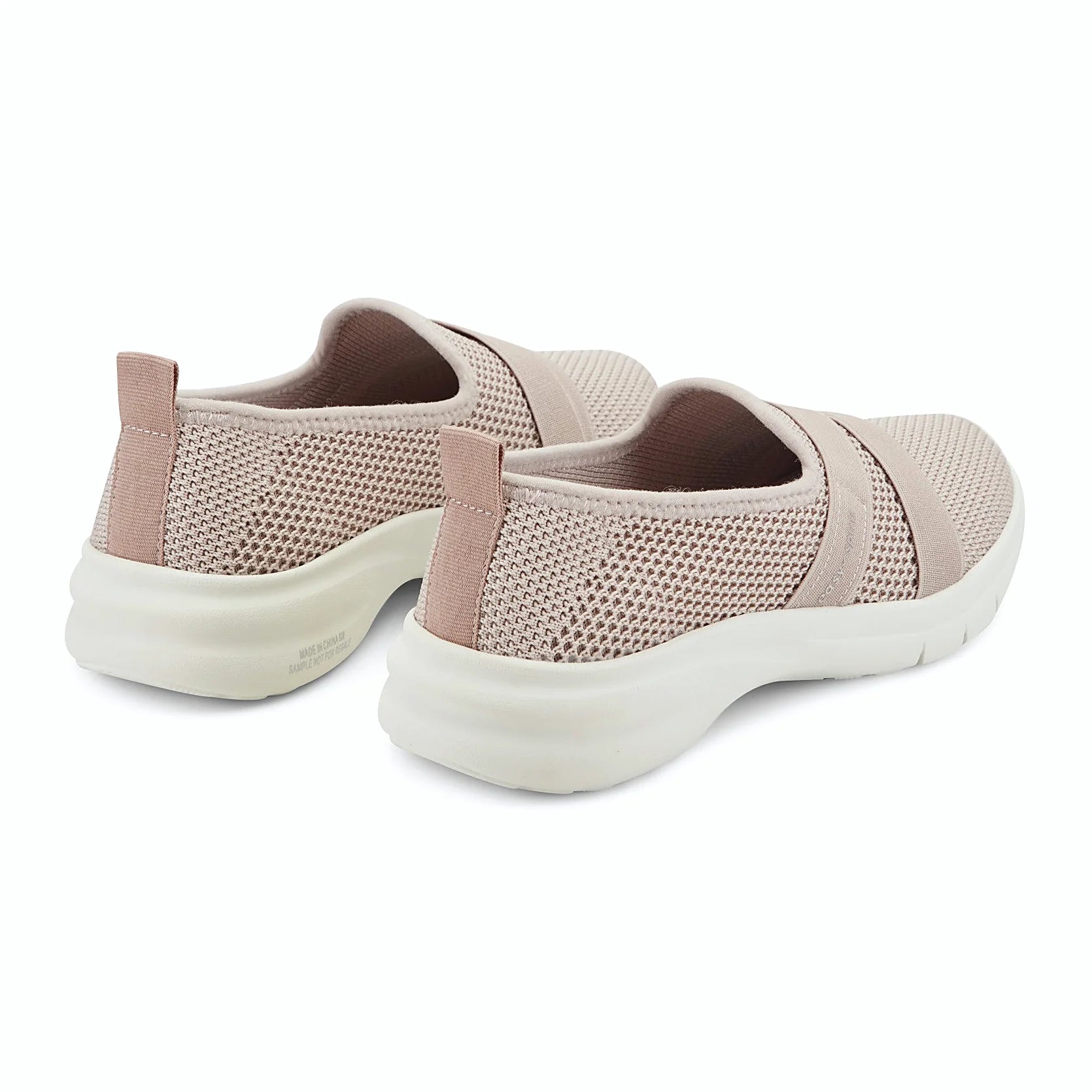 Pull tab at the heel of a slip-on walking shoe