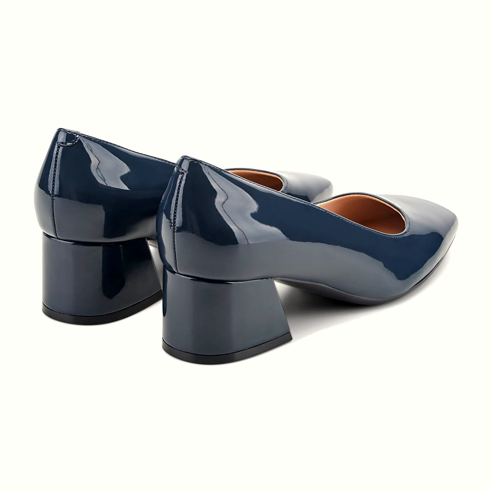 Clean unornamented upper on a square-toe pump