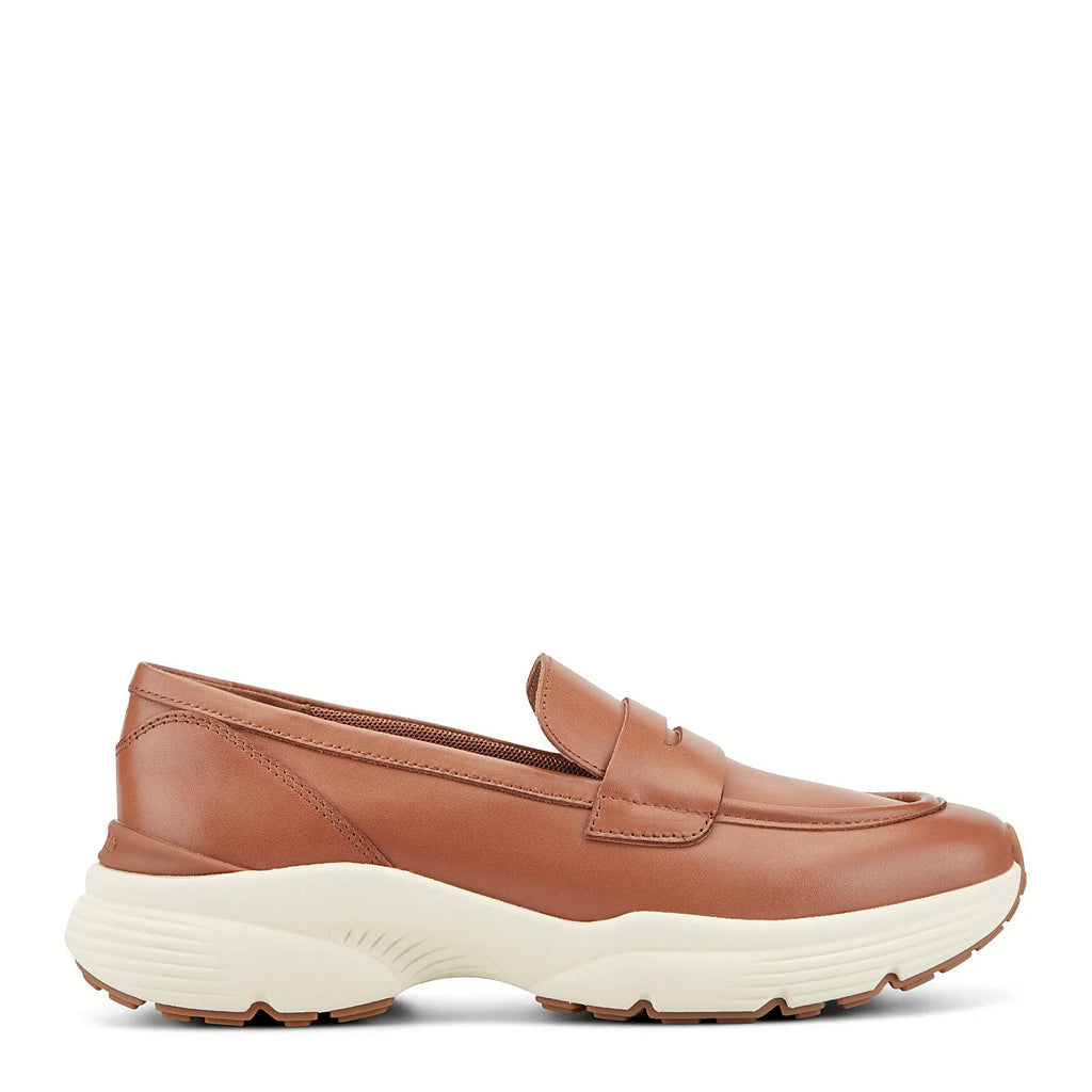 Rounded toe box on a platform penny loafer