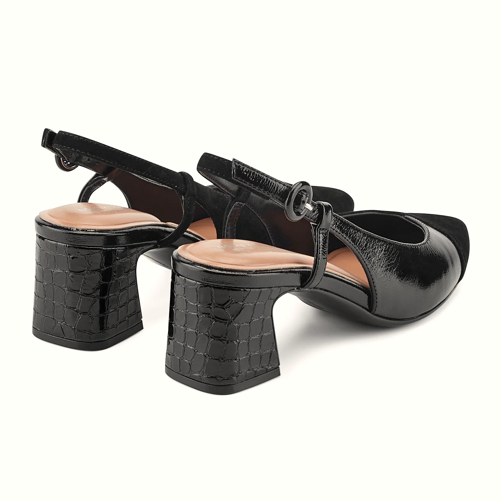 Slim adjustable strap with a buckle at the ankle