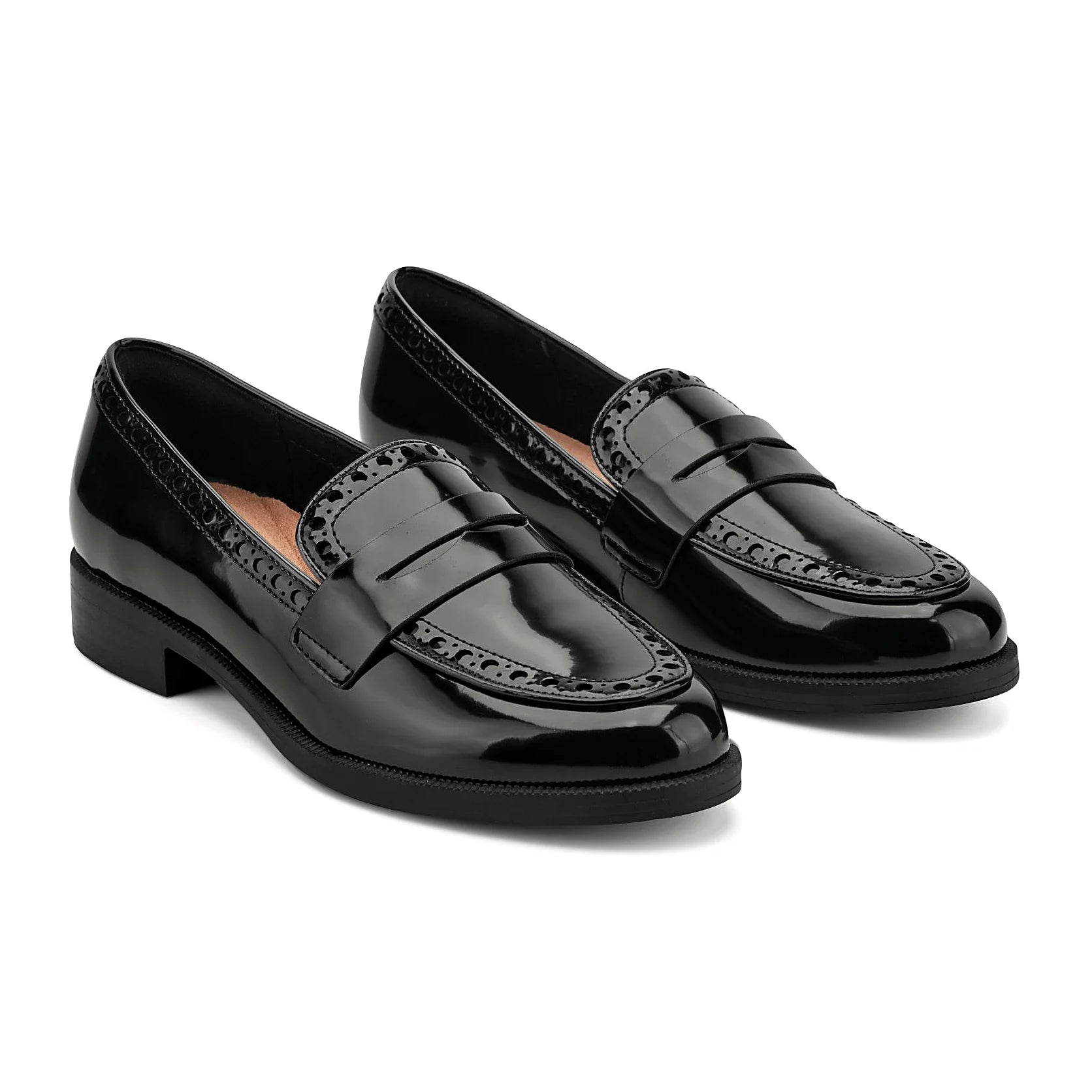 Perforated trim along the collar of a penny loafer