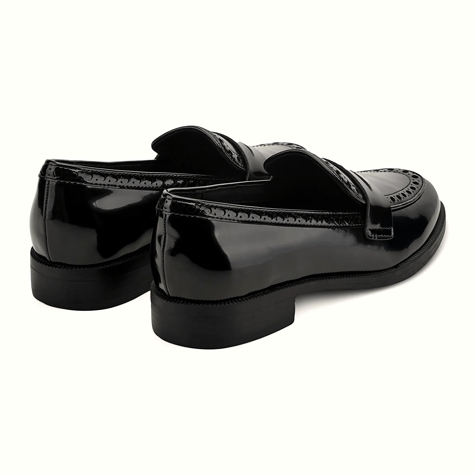 Low stacked heel under a high-shine loafer