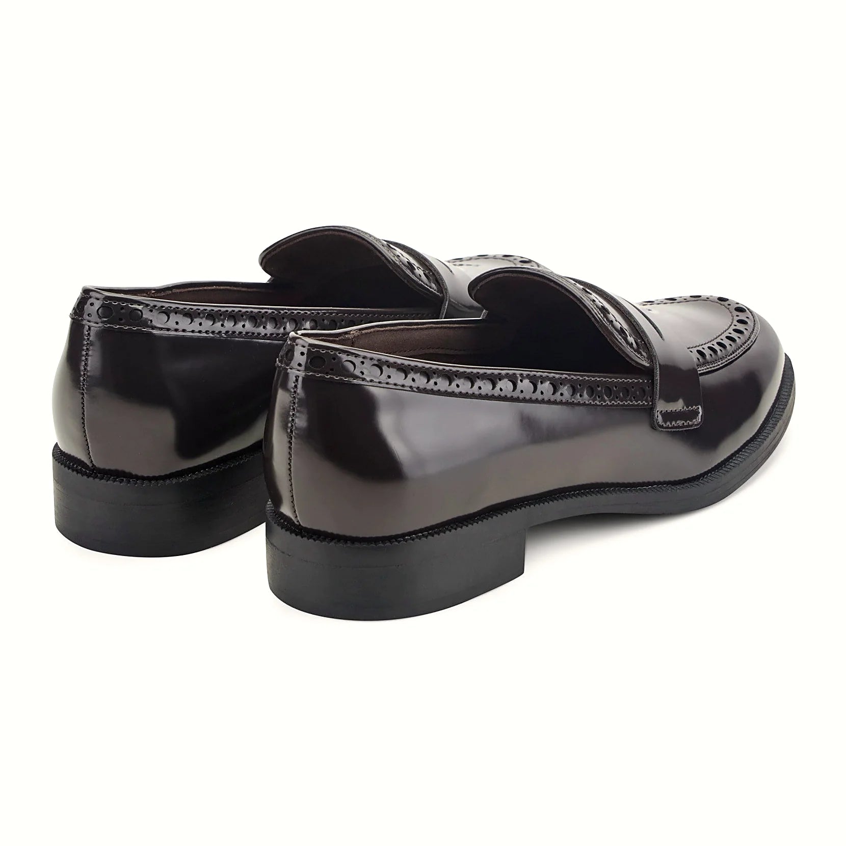 Low stacked heel under a high-shine loafer