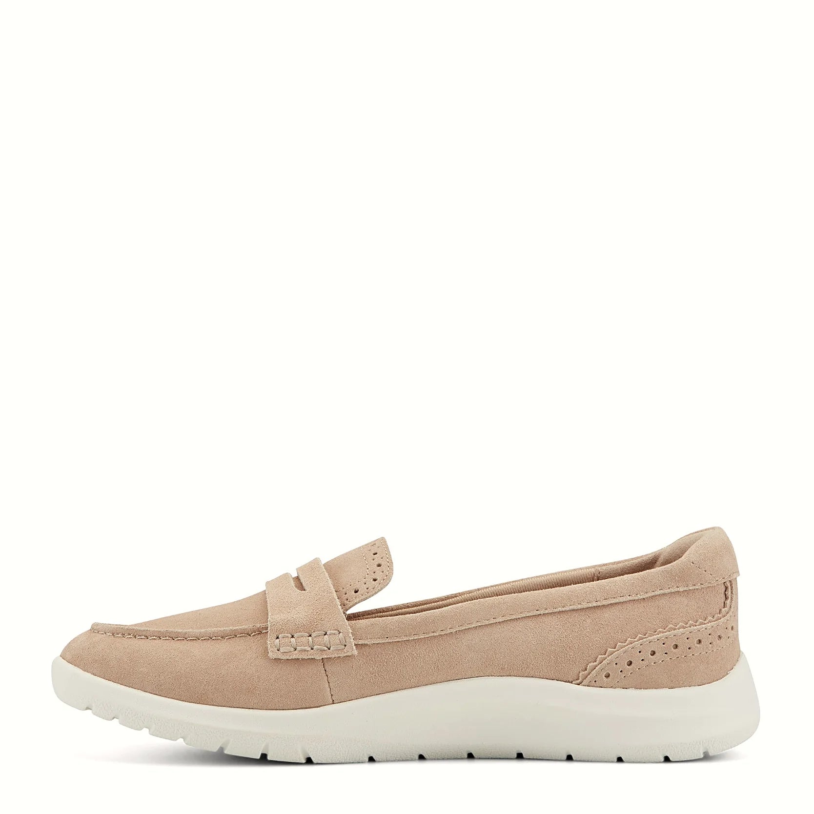 Flex grooves in the outsole of a penny loafer