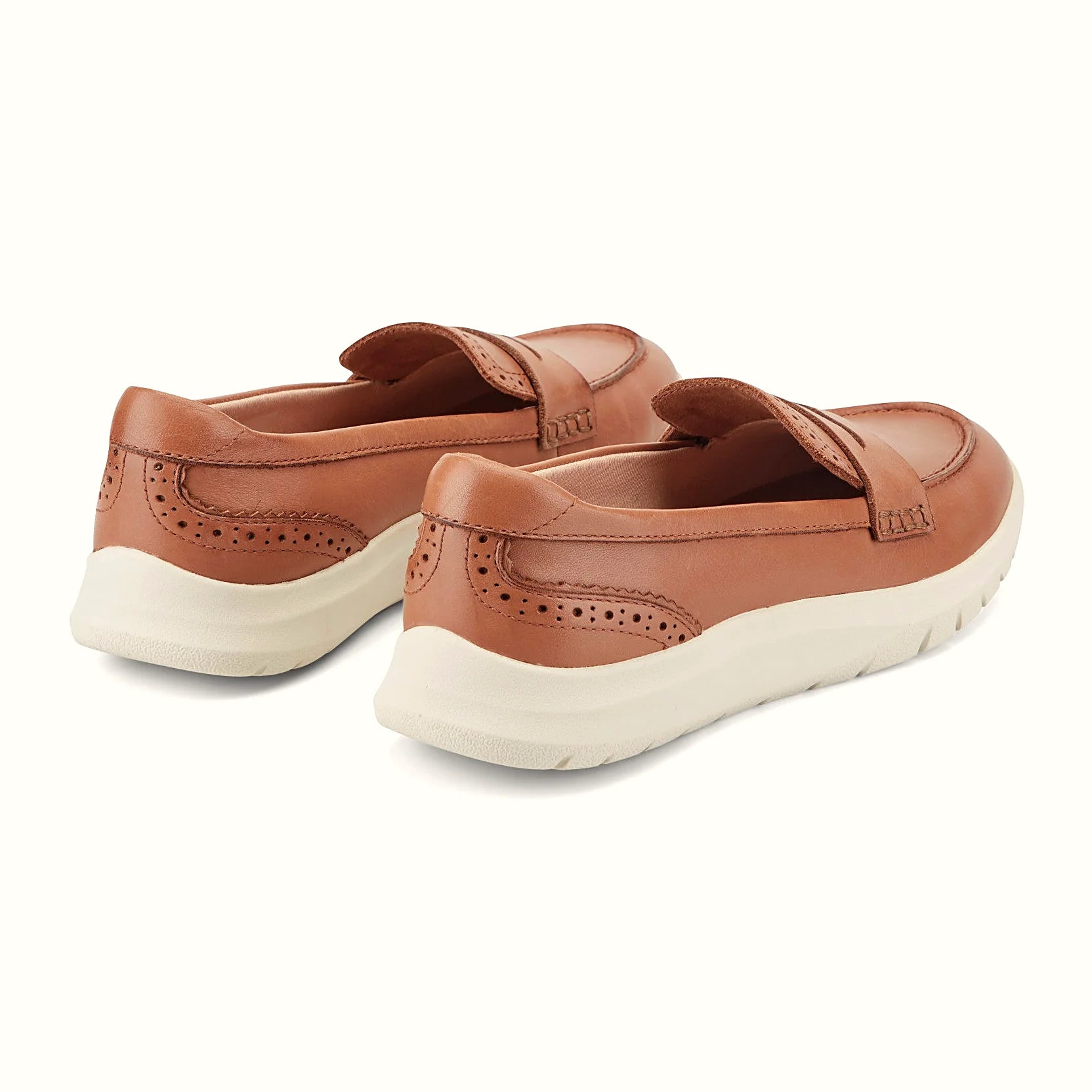 Moc-toe stitching on a leather penny loafer