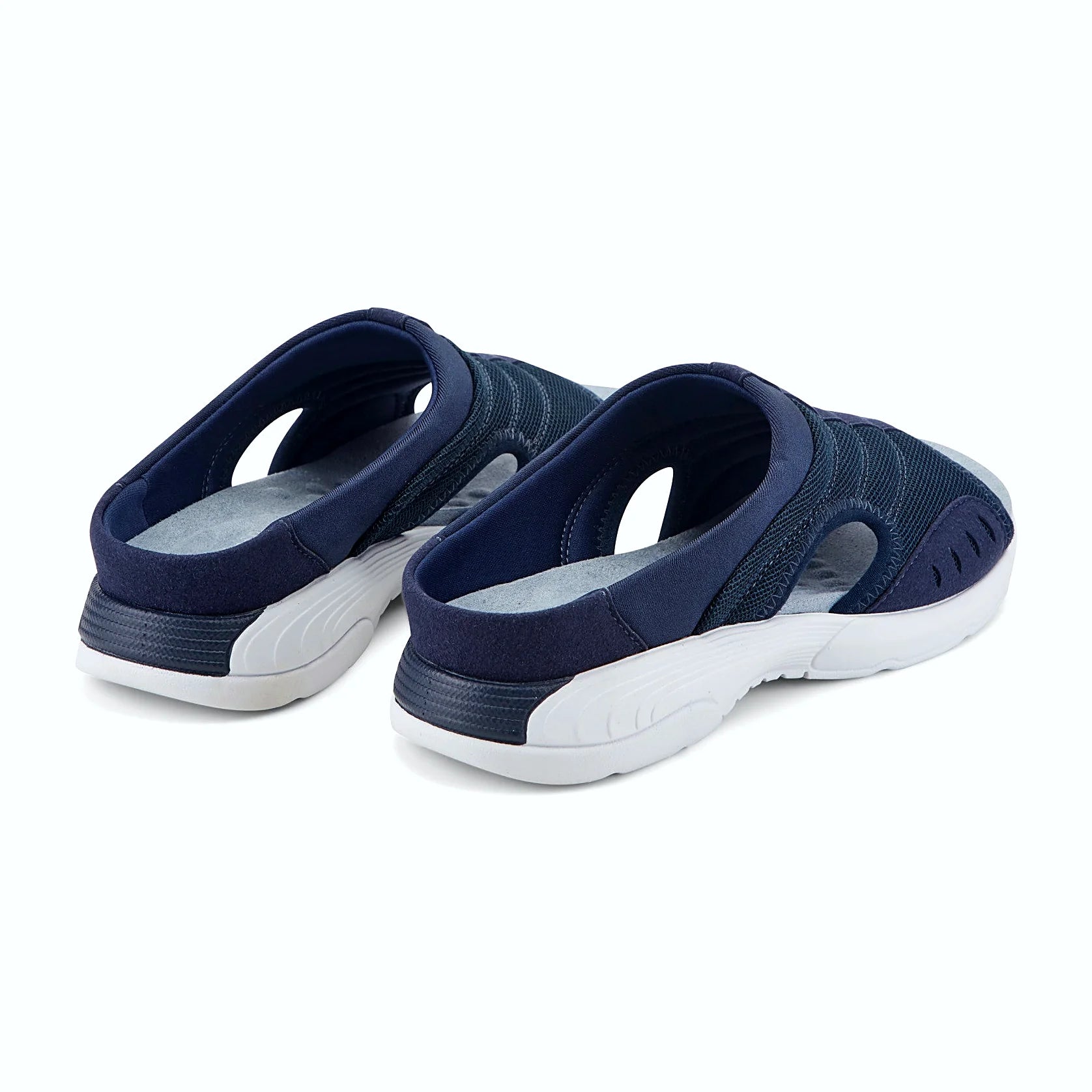 Textured massage pods on the footbed of a sandal