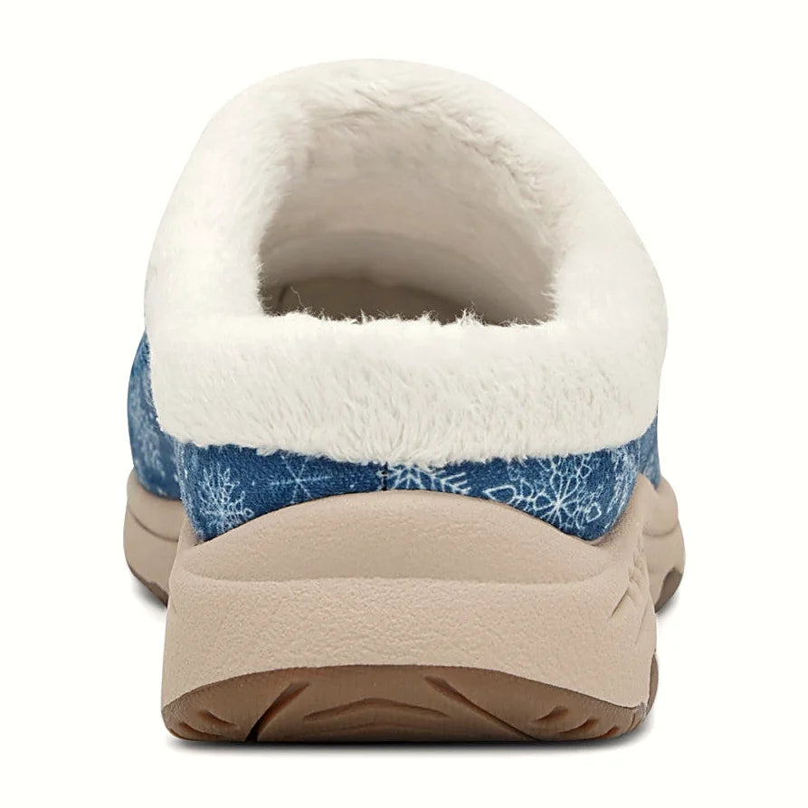 Removable molded footbed from a rocker-sole clog