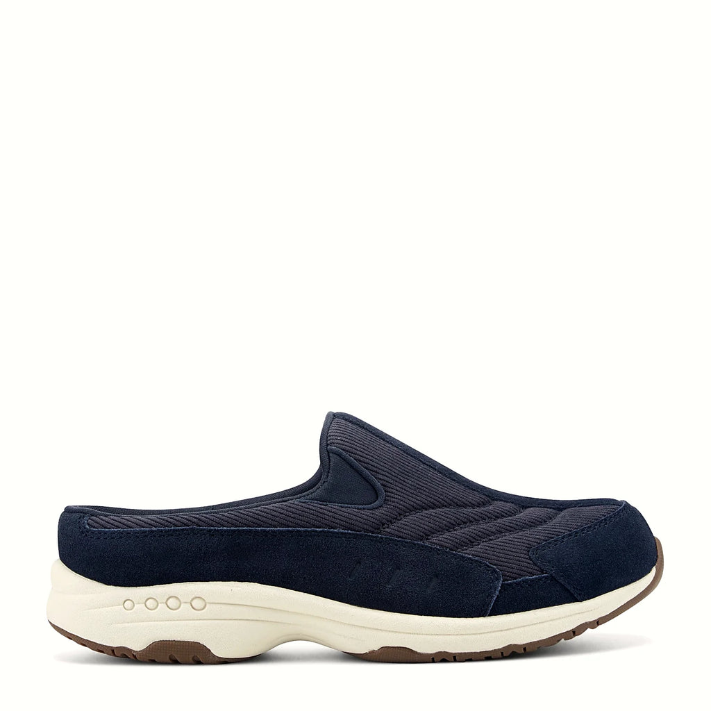 Slip-on clog with suede overlays framing a textured panel