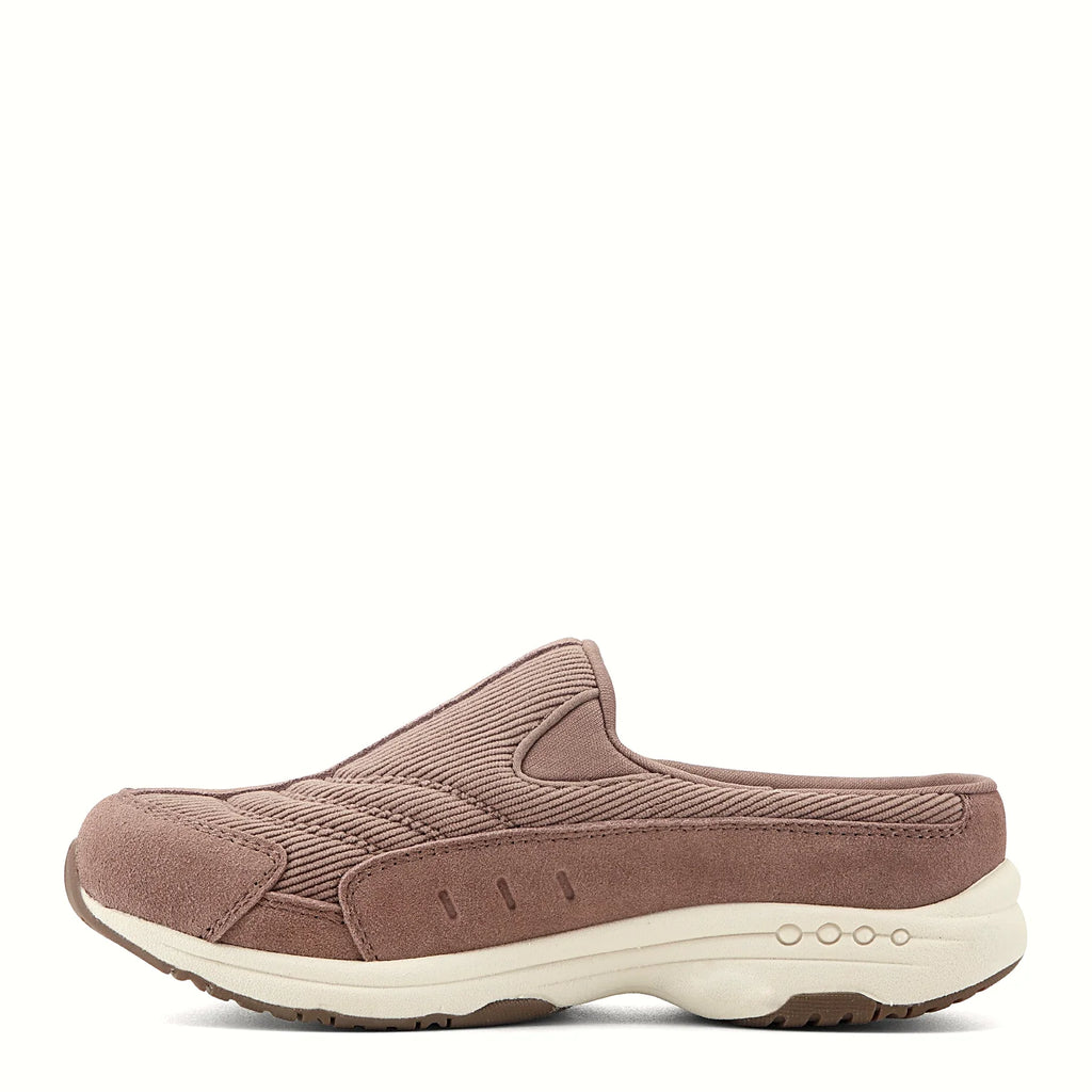 Slip-on clog with suede overlays framing a textured panel