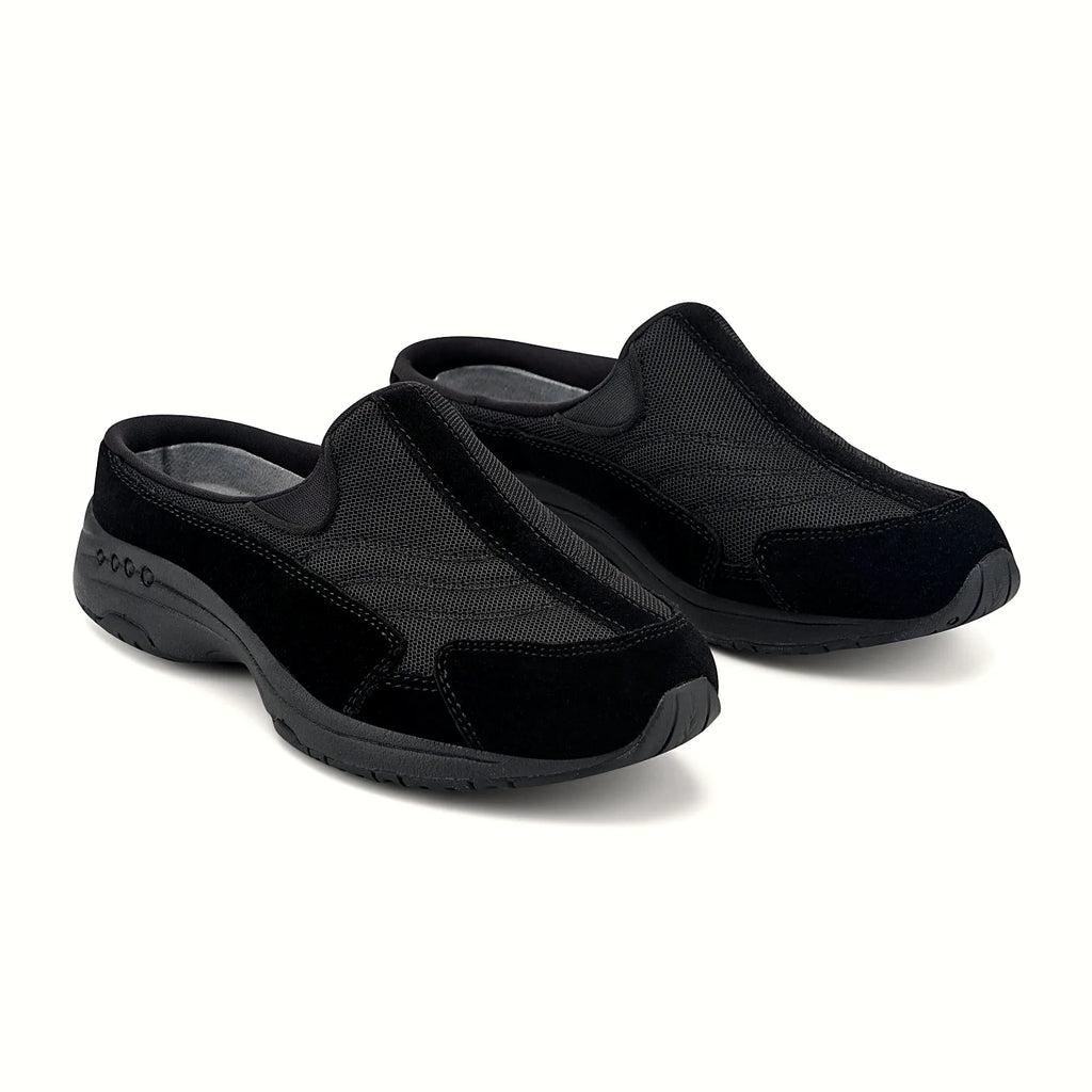 Comfort-well detailing along the midsole of a clog
