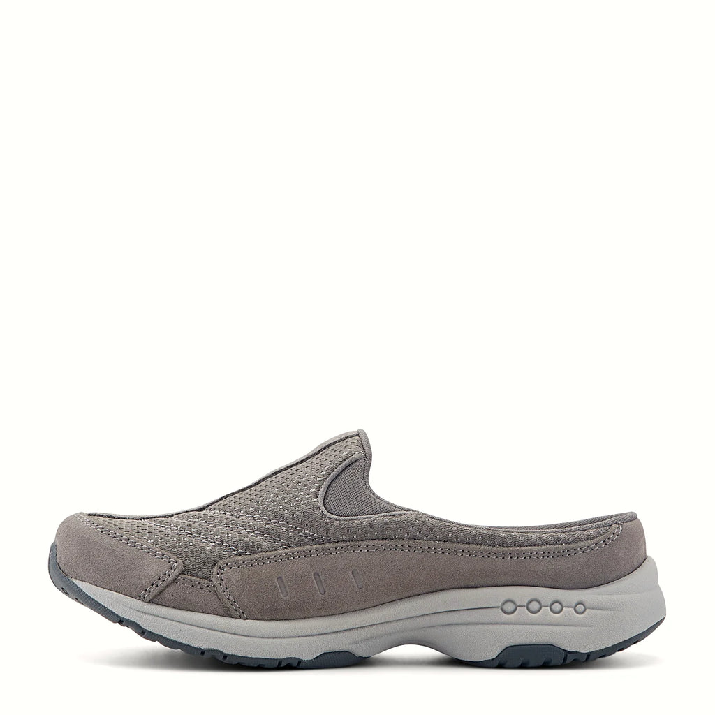 Slip-on clog with suede overlays framing a textured panel