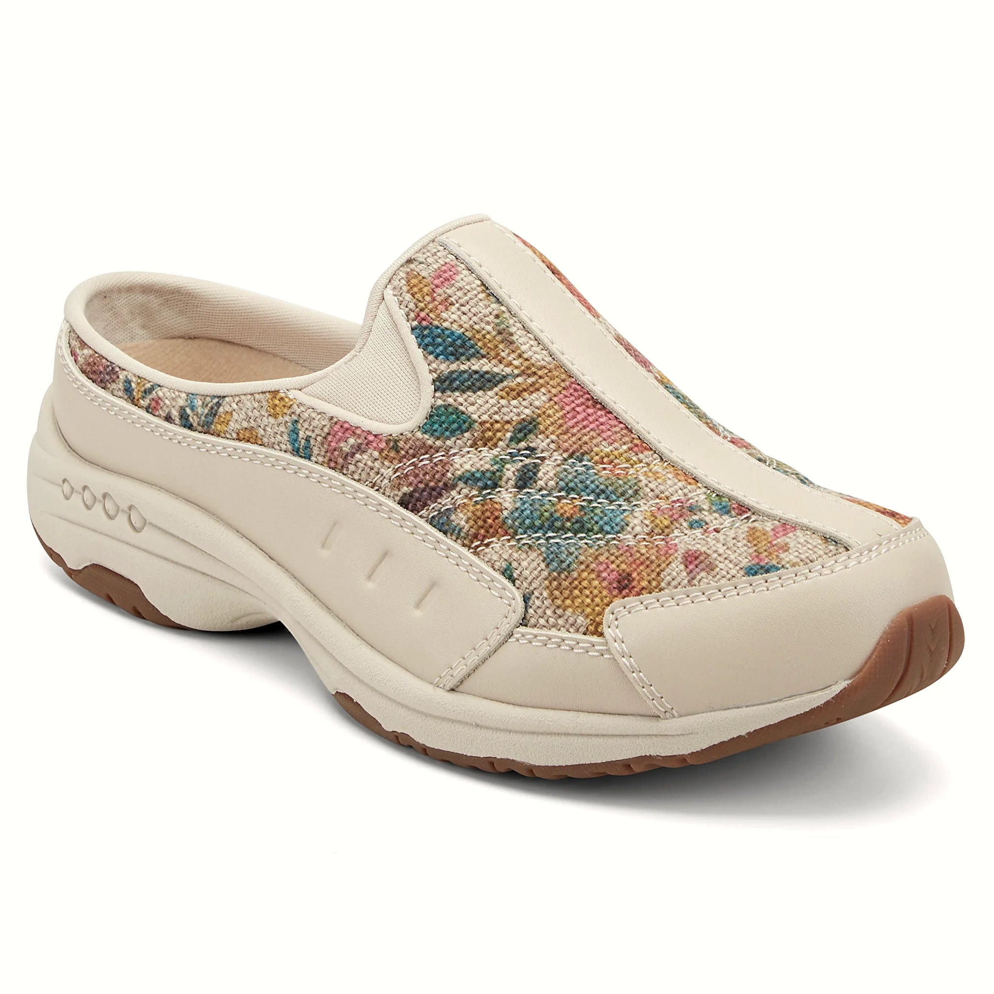 Comfort-well detailing along the midsole of a clog