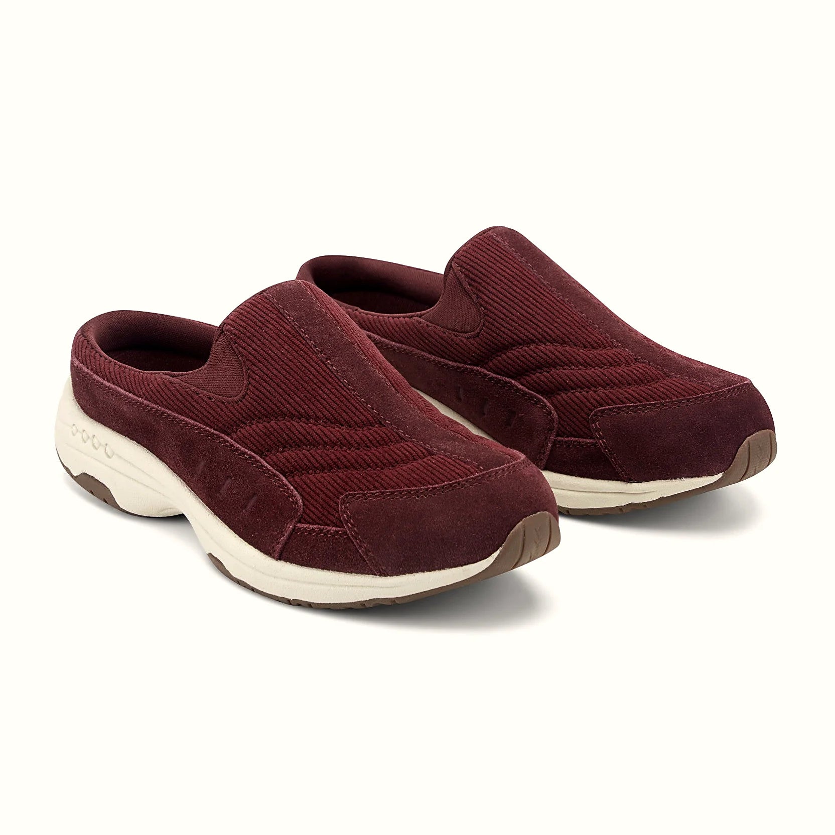 Molded footbed inside a suede-overlay clog