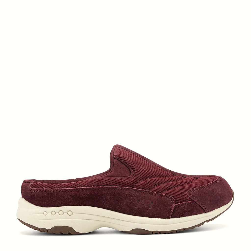 Comfort-well detailing along the midsole of a clog