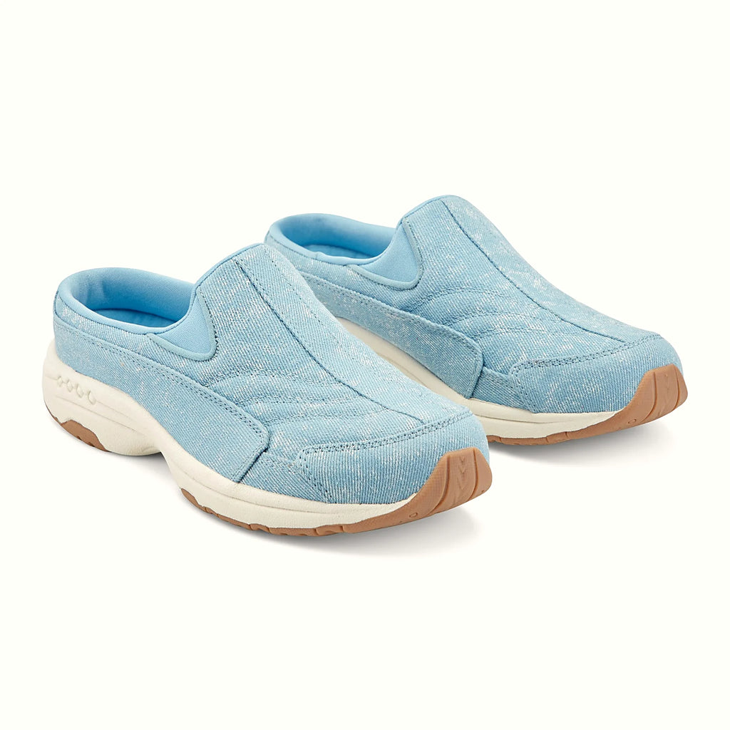 Comfort-well detailing along the midsole of a clog