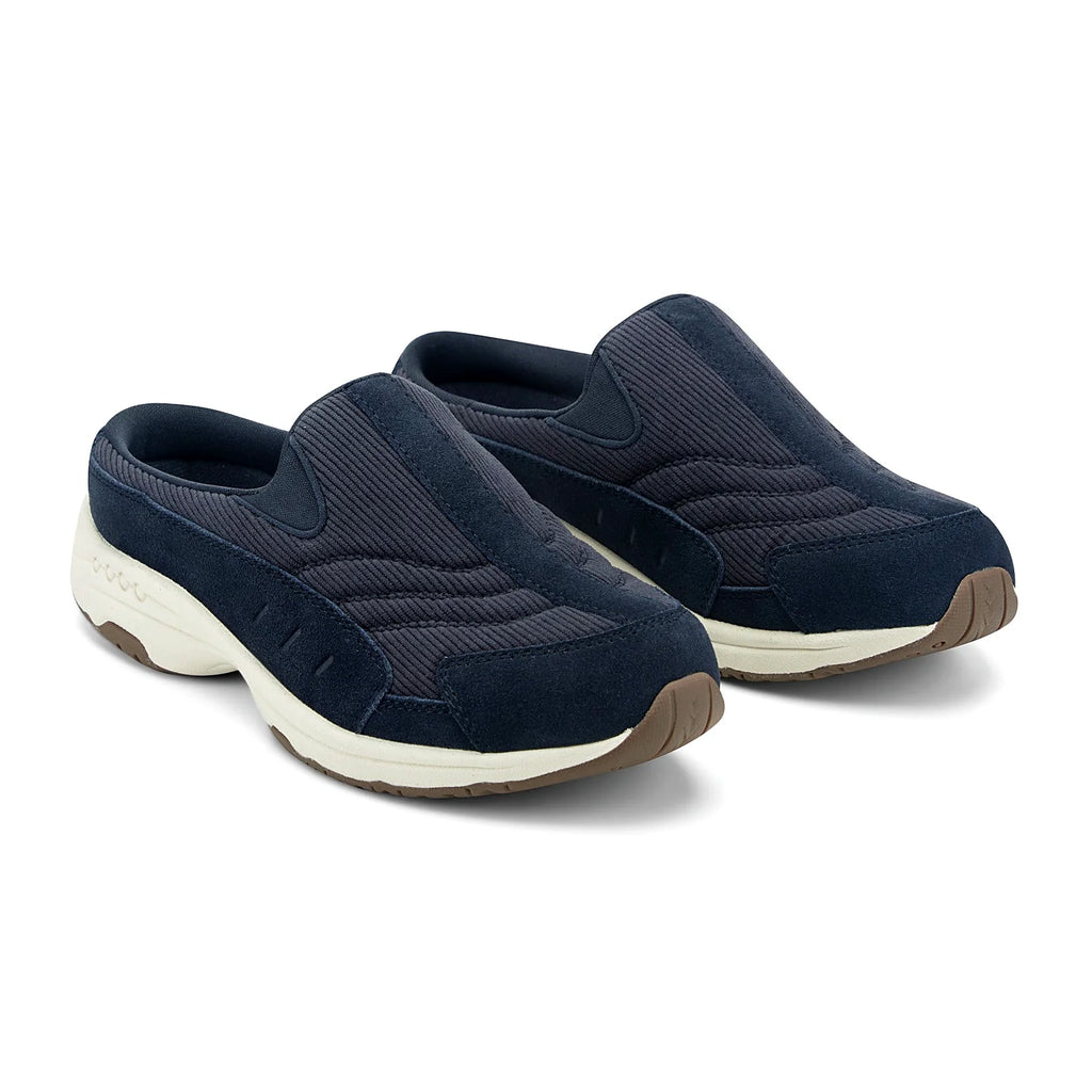 Comfort-well detailing along the midsole of a clog