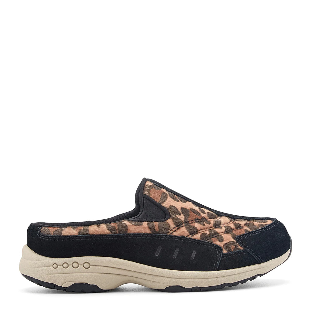 Slip-on clog with suede overlays framing a textured panel