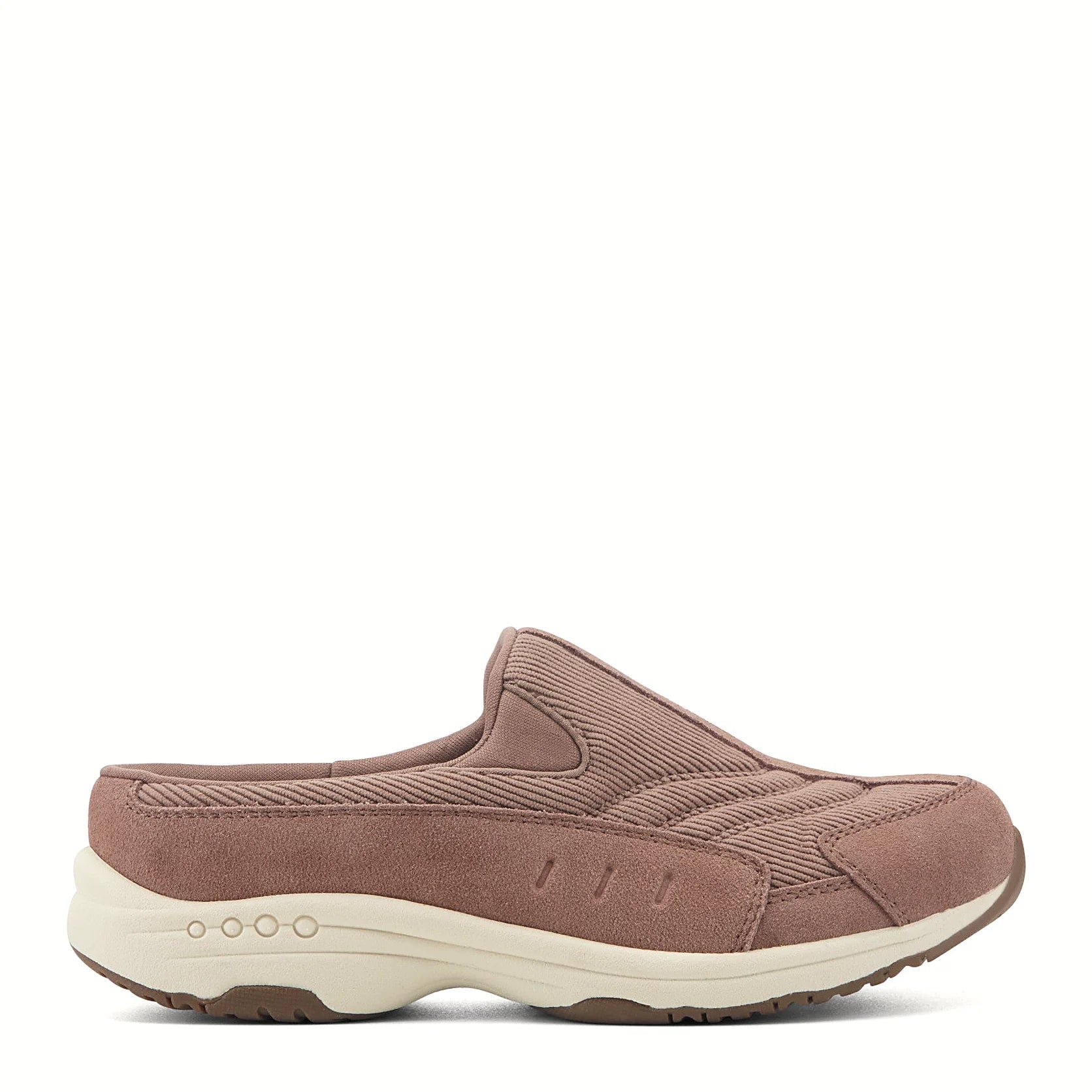 Comfort-well detailing along the midsole of a clog