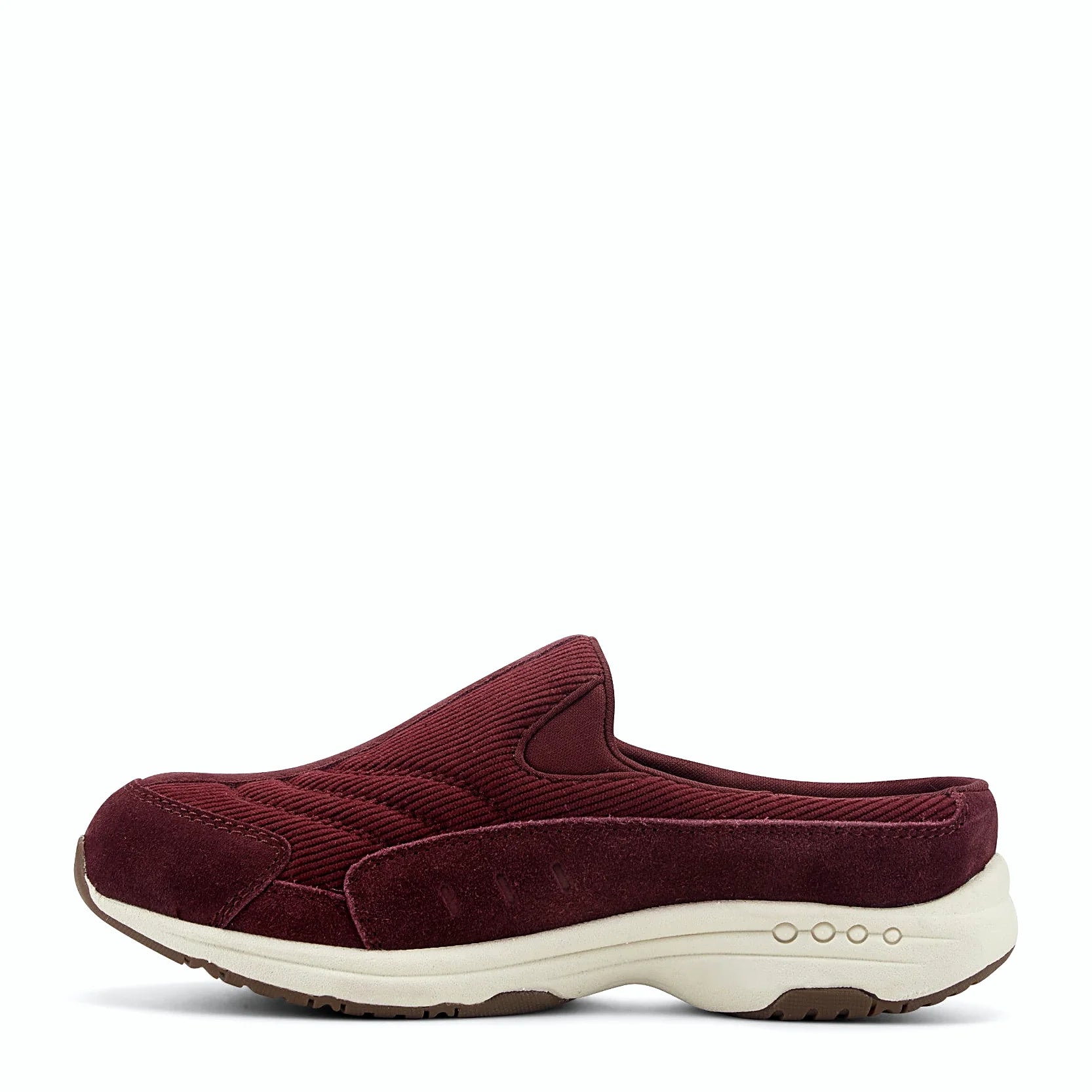 Slip-on clog with suede overlays framing a textured panel