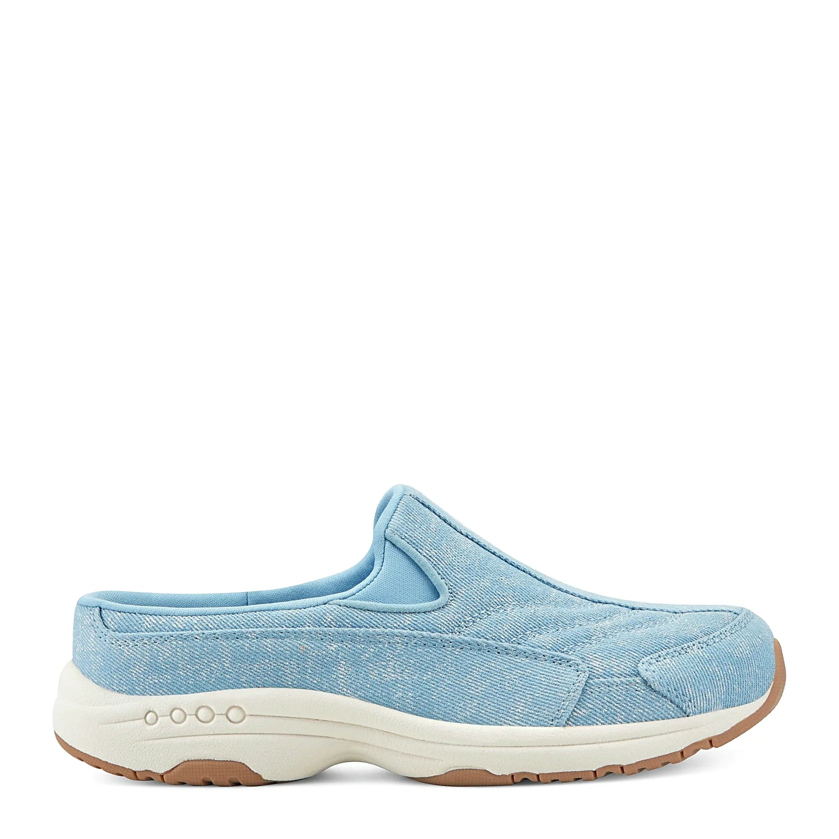 Slip-on clog with suede overlays framing a textured panel