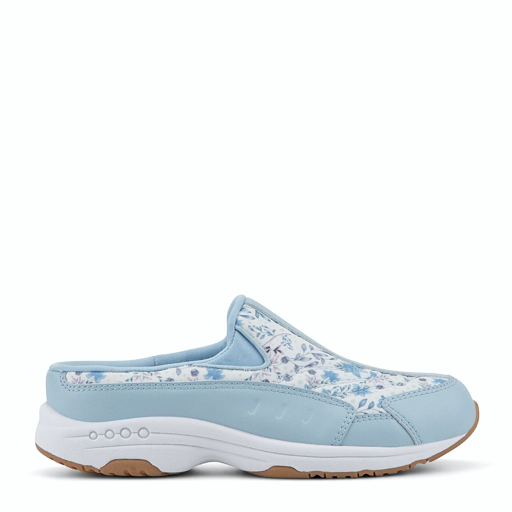 Comfort-well detailing along the midsole of a clog
