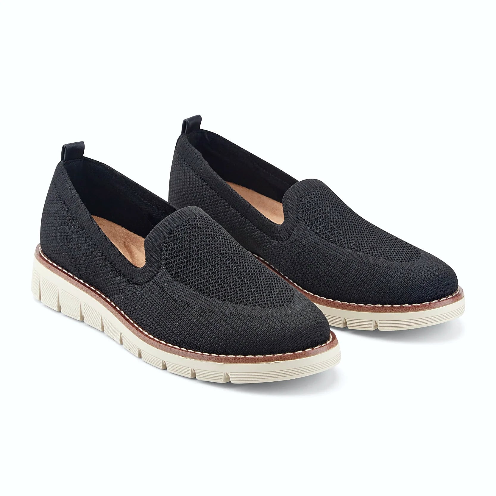 Contrast-stitched trim along the sole of a knit flat