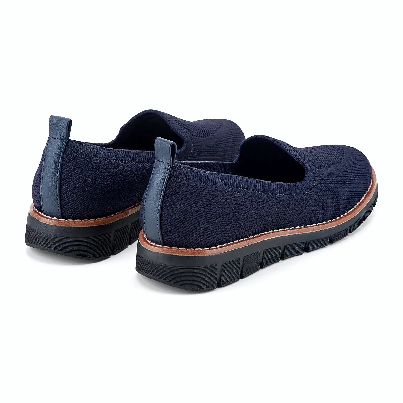Knit slip-on flat with a stretch knit topline