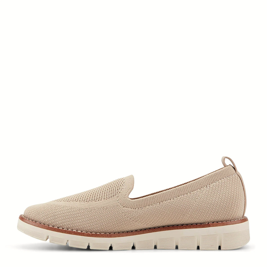 Contrast-stitched trim along the sole of a knit flat