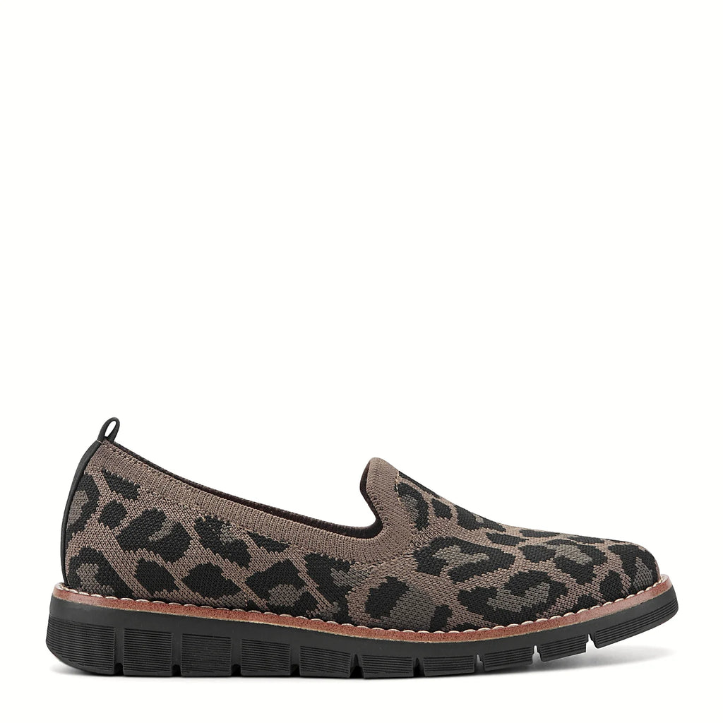 Knit slip-on flat with a stretch knit topline