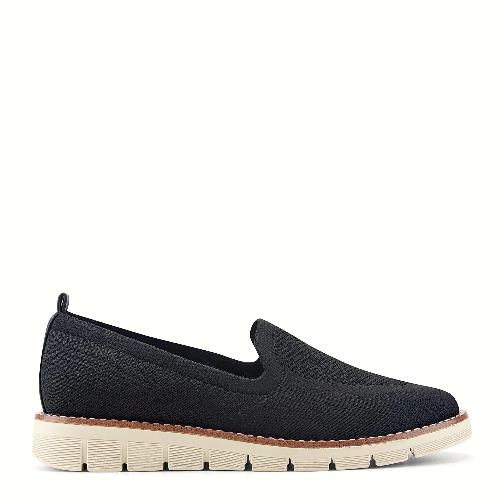 Pull tab at the heel of a knit slip-on flat
