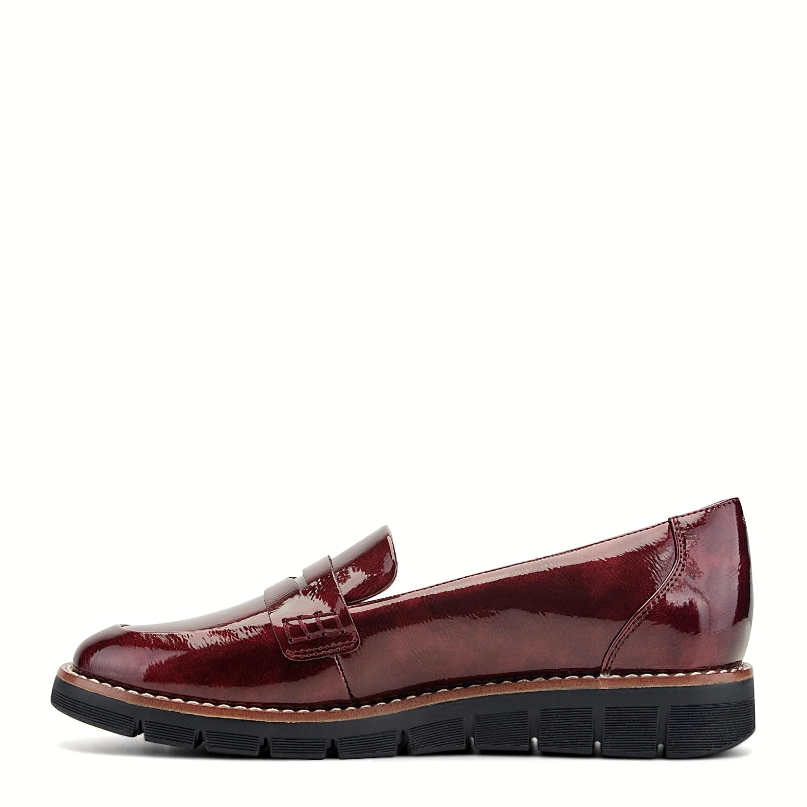 Molded footbed inside a slip-on penny loafer