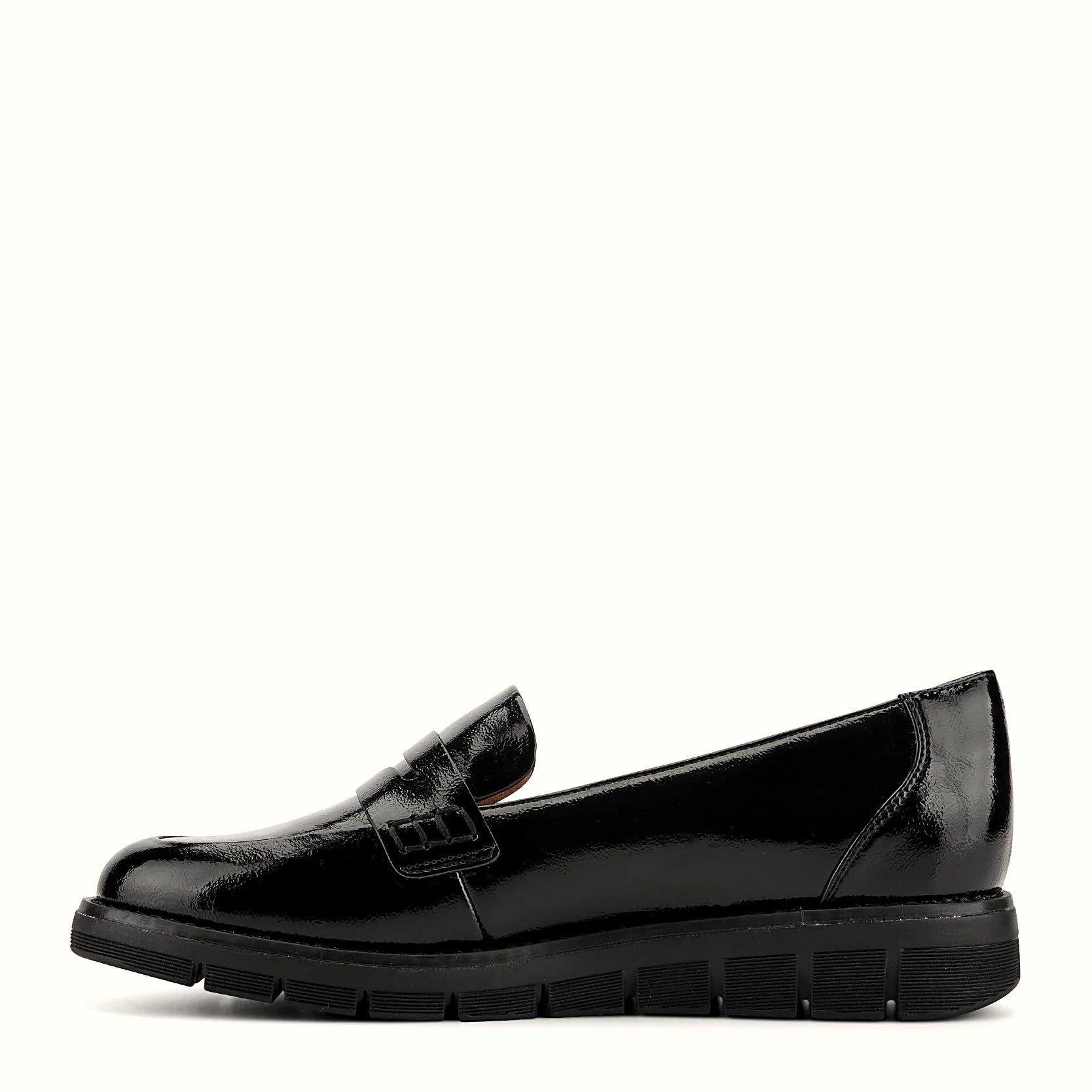Molded footbed inside a slip-on penny loafer