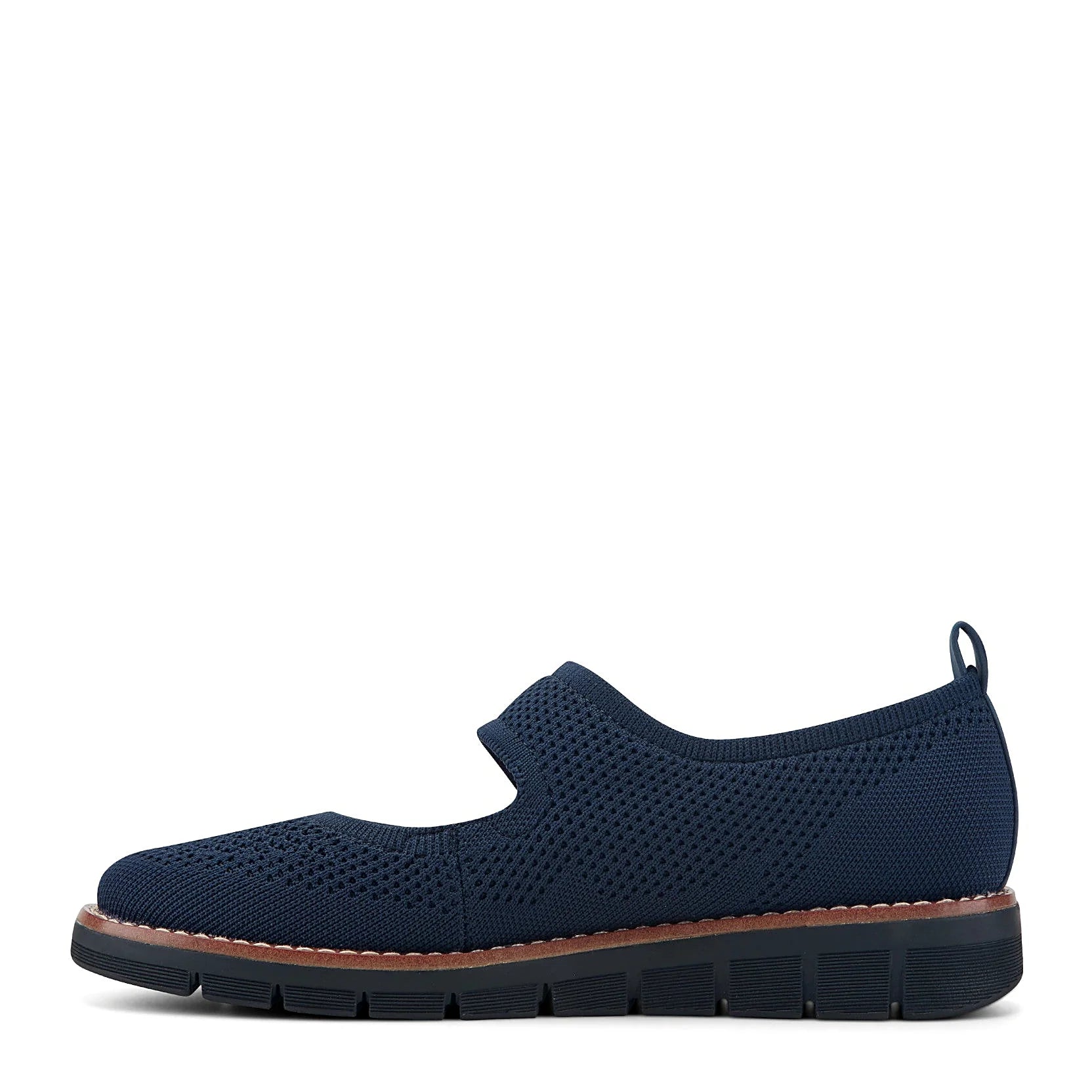 Grooved outsole under a knit platform flat