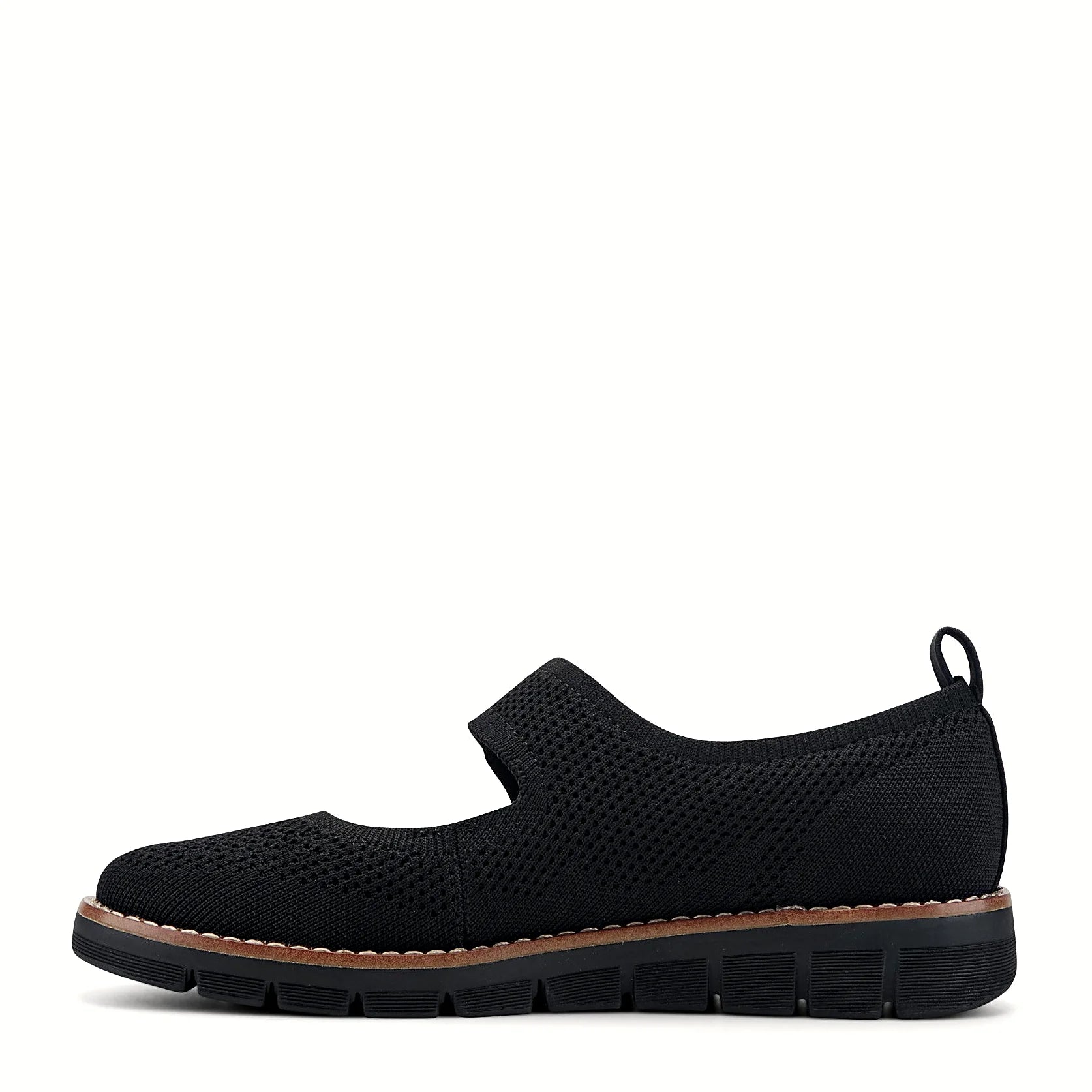 Grooved outsole under a knit platform flat