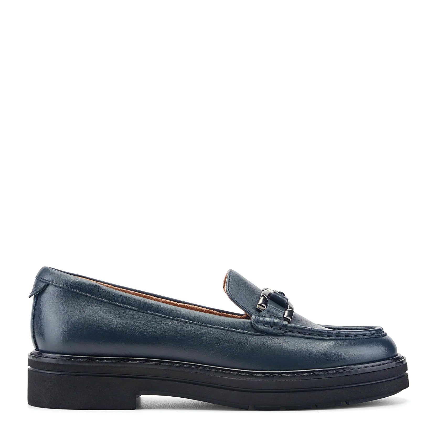 Contrast topstitching along the moc-toe seam of a suede loafer