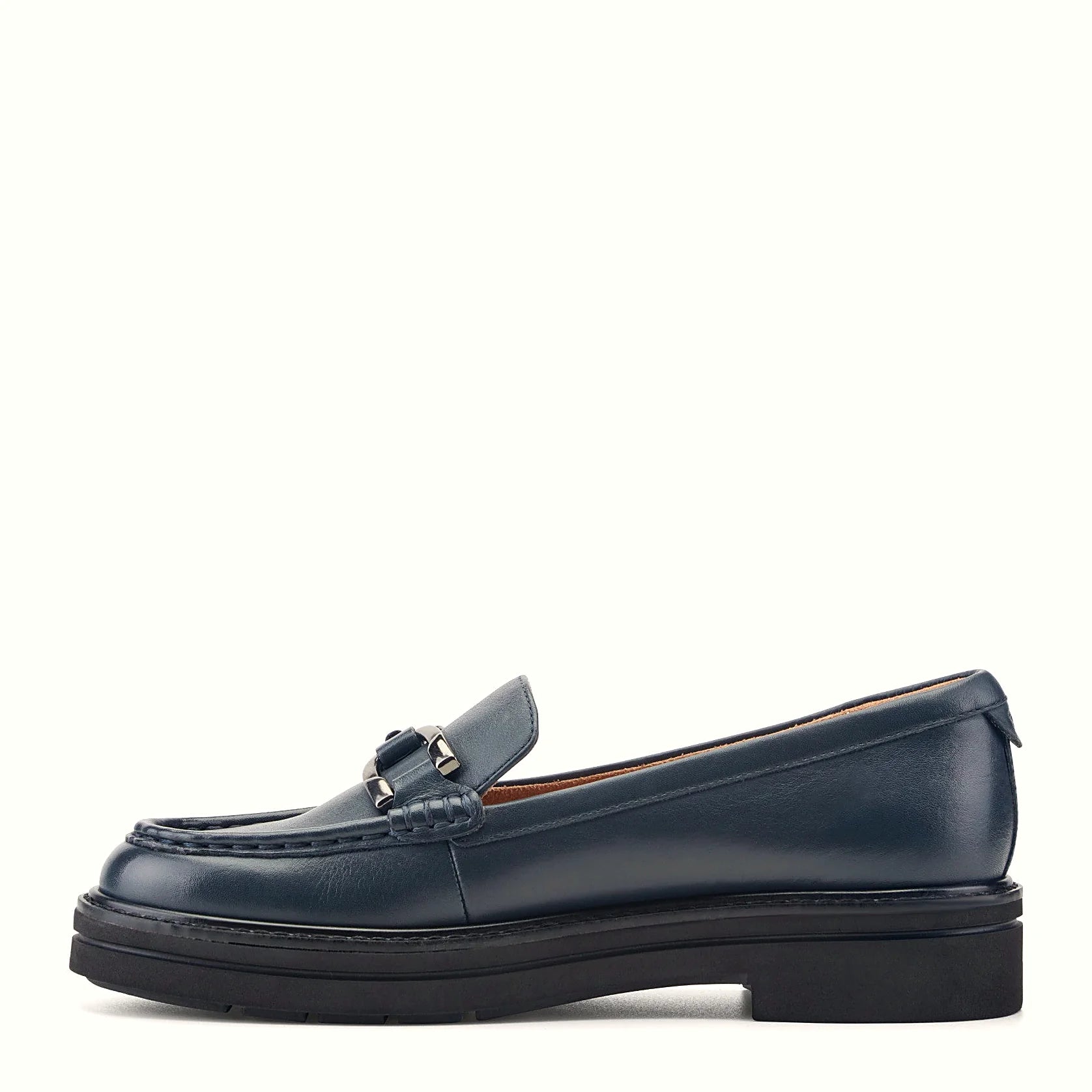 Suede loafer with a horsebit detail across the vamp